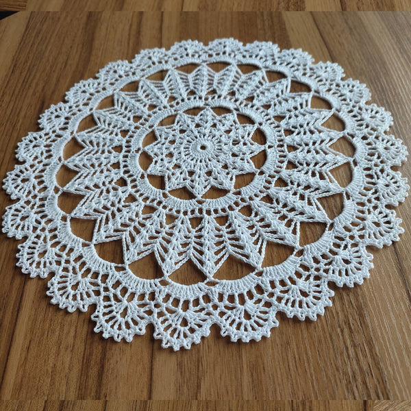 Classic white round crochet doily for decorating breakfast trays and flower compositions