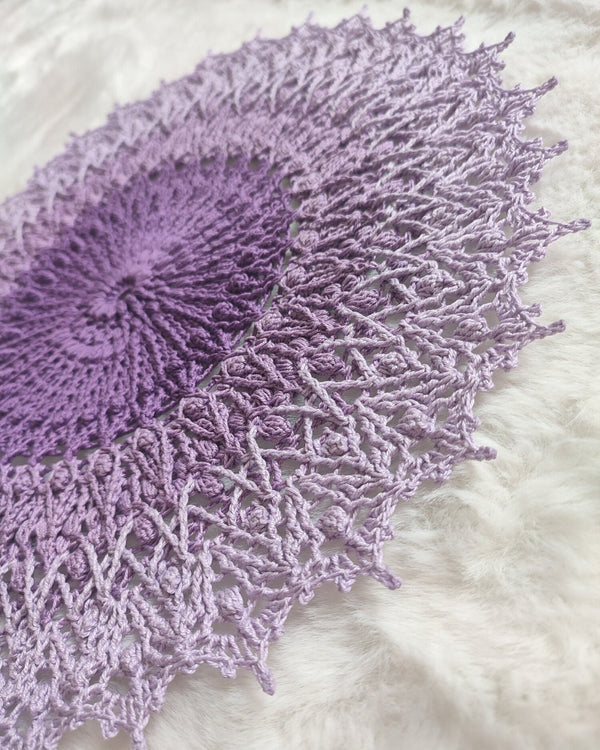 Lavender purple textured crochet doily