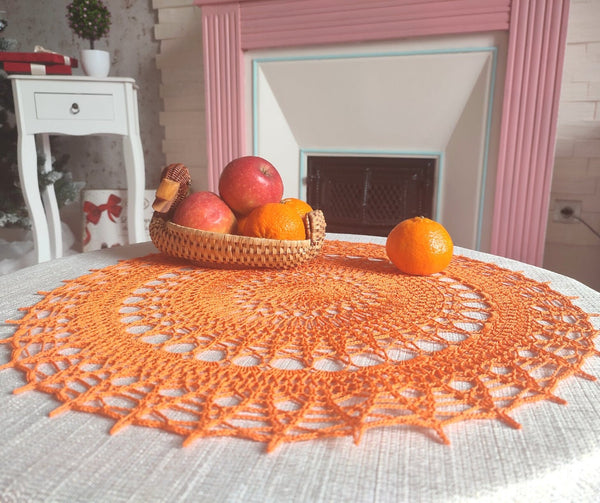 Bright orange large and cheerful lace crochet doily