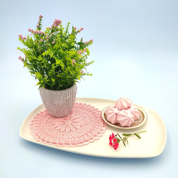 Valentine's day table decor set of a pink crochet placemat and a coaster with hearts