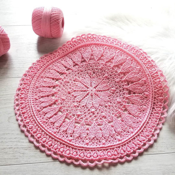 Romantic crochet set of two round placemats with hearts in blue and pink colour