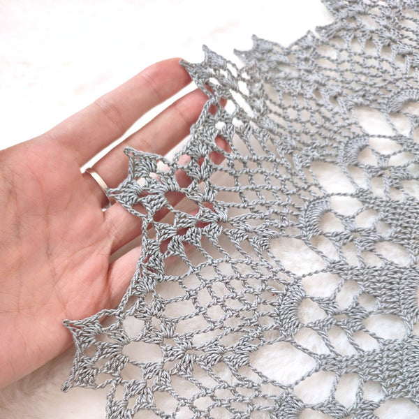 Delicate silver grey lace doily