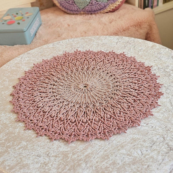 Pink crochet textured doily with glitter