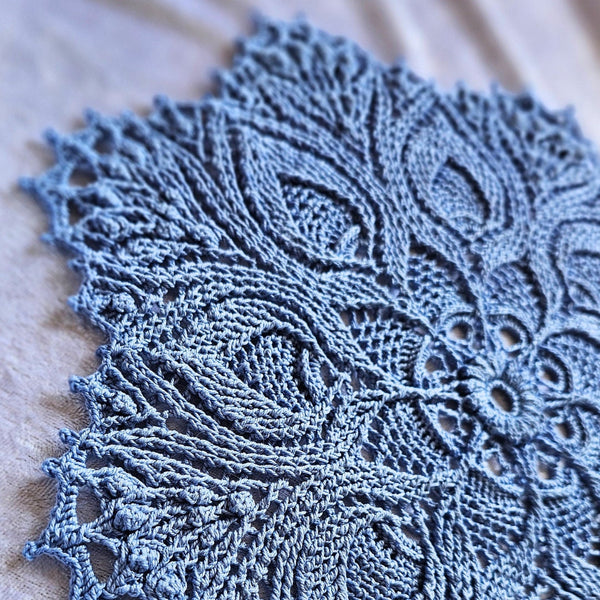 Blue textured doily mandala 30cm diameter.