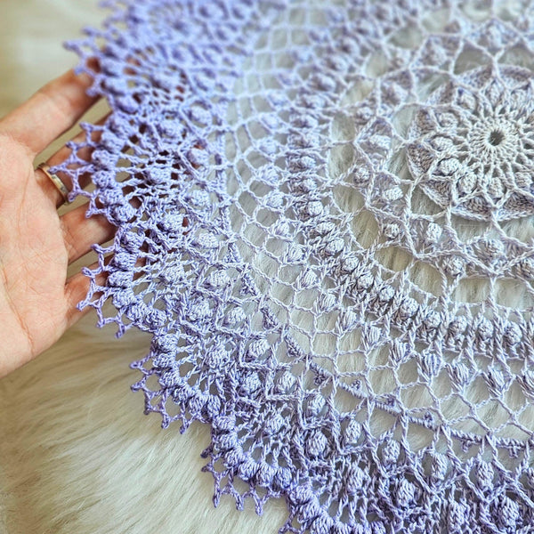Light purple gradient textured doily 37 cm diameter.