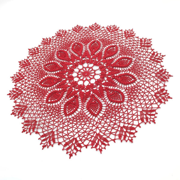 Deep red round crochet doily with 3D elements