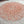 Peach colour round lace doily for elegant table or breakfast tray decoration
