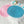 Romantic crochet set of two round placemats with hearts in blue and pink colour