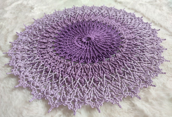 Lavender purple textured crochet doily