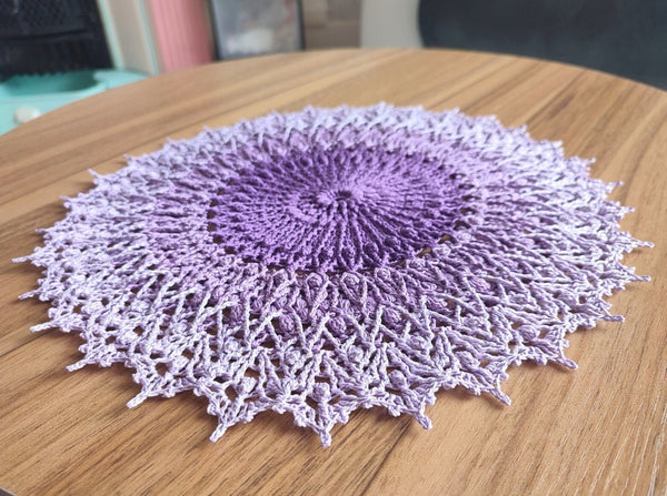 Lavender purple textured crochet doily