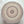 Large multicoloured crochet doily made in shades of natural beige and brown