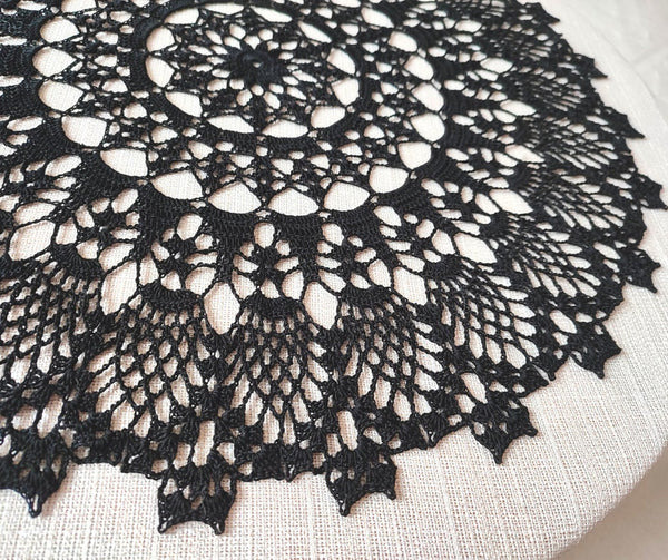 Black lace handmade crochet doily with gothic pattern