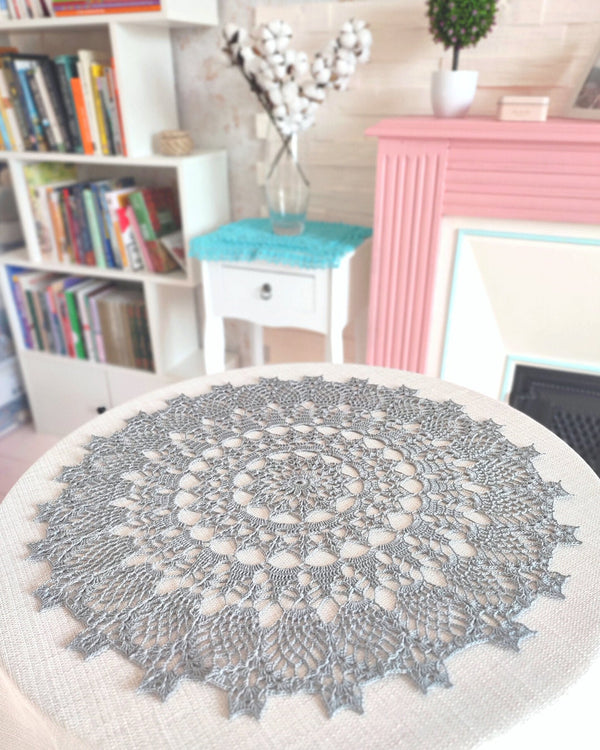 Delicate silver grey lace doily