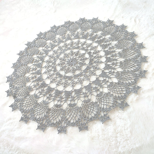 Delicate silver grey lace doily