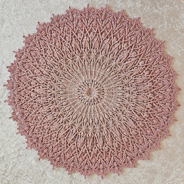 Pink crochet textured doily with glitter