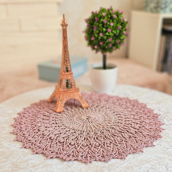 Pink crochet textured doily with glitter