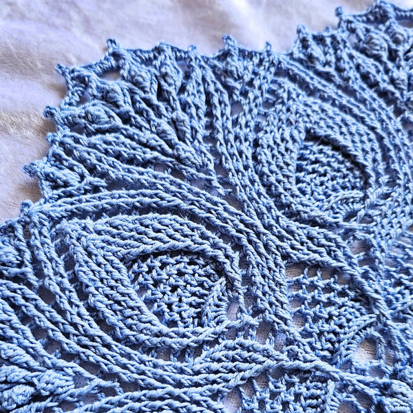 Blue textured doily mandala 30cm diameter.