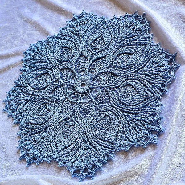 Blue textured doily mandala 30cm diameter.