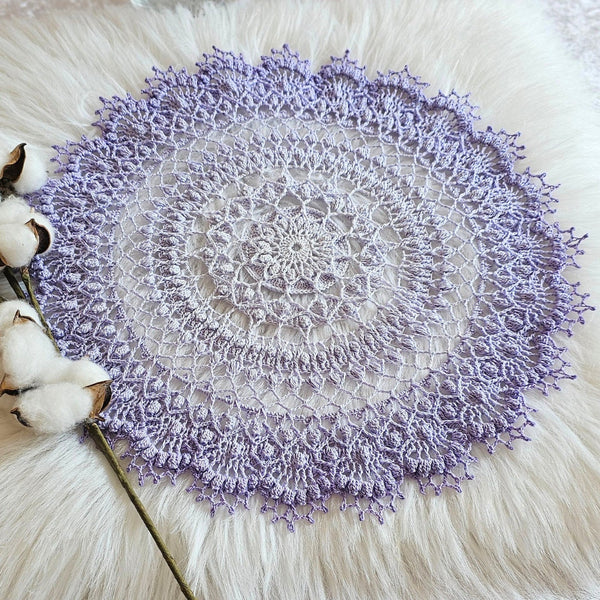 Light purple gradient textured doily 37 cm diameter.
