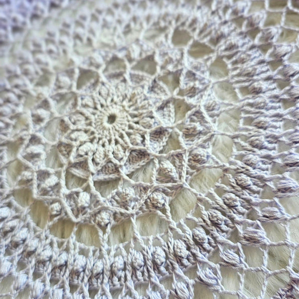 Light purple gradient textured doily 37 cm diameter.