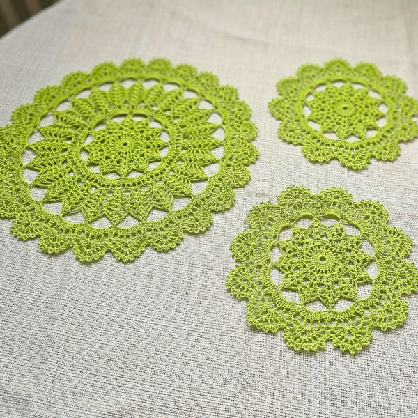 Set of a light green crochet doily and two coasters for an elegant vintage style tea party.